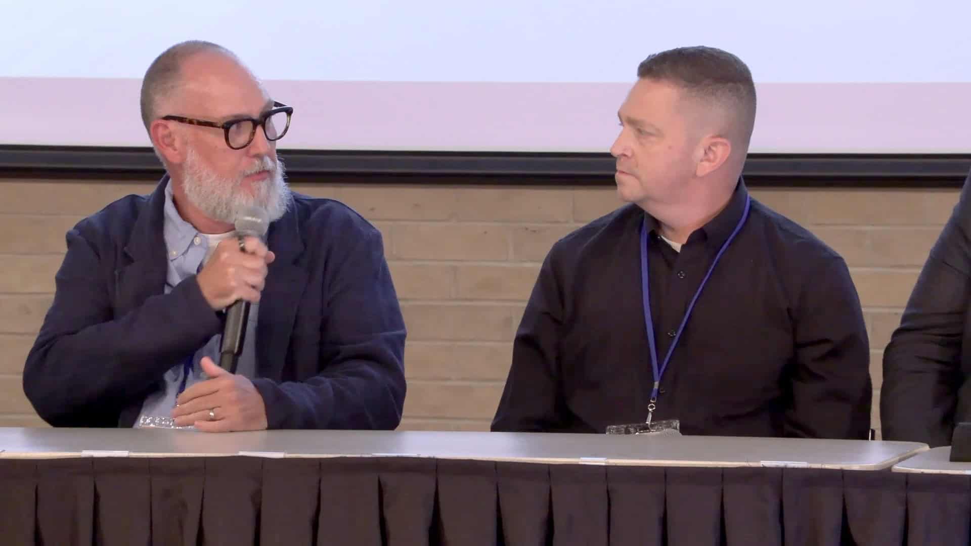 Matthew Jetmore speaks as Bill Callahan Jr. listens during the Ditch the Spreadsheet panel at AggNexus 2026