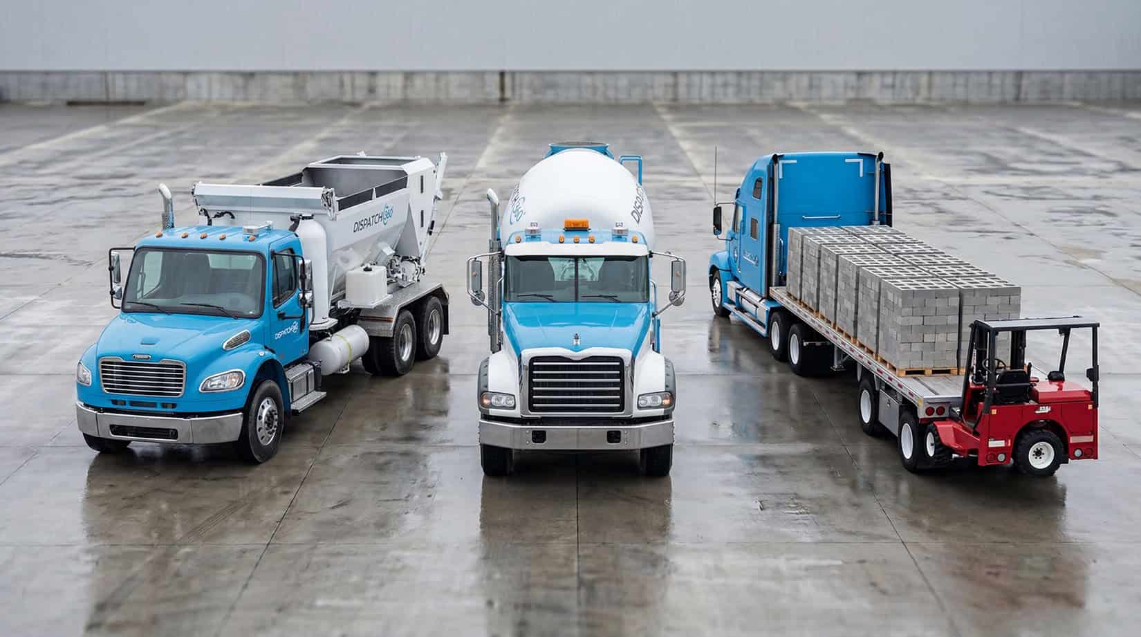 Dispatch360 concrete fleet \u2014 volumetric mixer, ready-mix drum truck, and block flatbed with forklift at a concrete yard